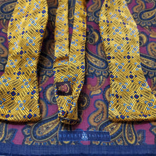 Load image into Gallery viewer, Gold and blue bowtie with complimenting paisley pocket square by Robert Talbott
