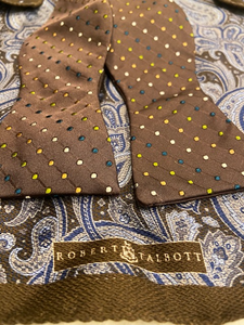 Robert Talbott brown polka dot bowtie with a reversible paisley silk pocket square