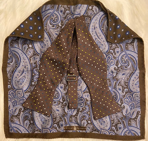 Robert Talbott brown polka dot bowtie with a reversible paisley silk pocket square